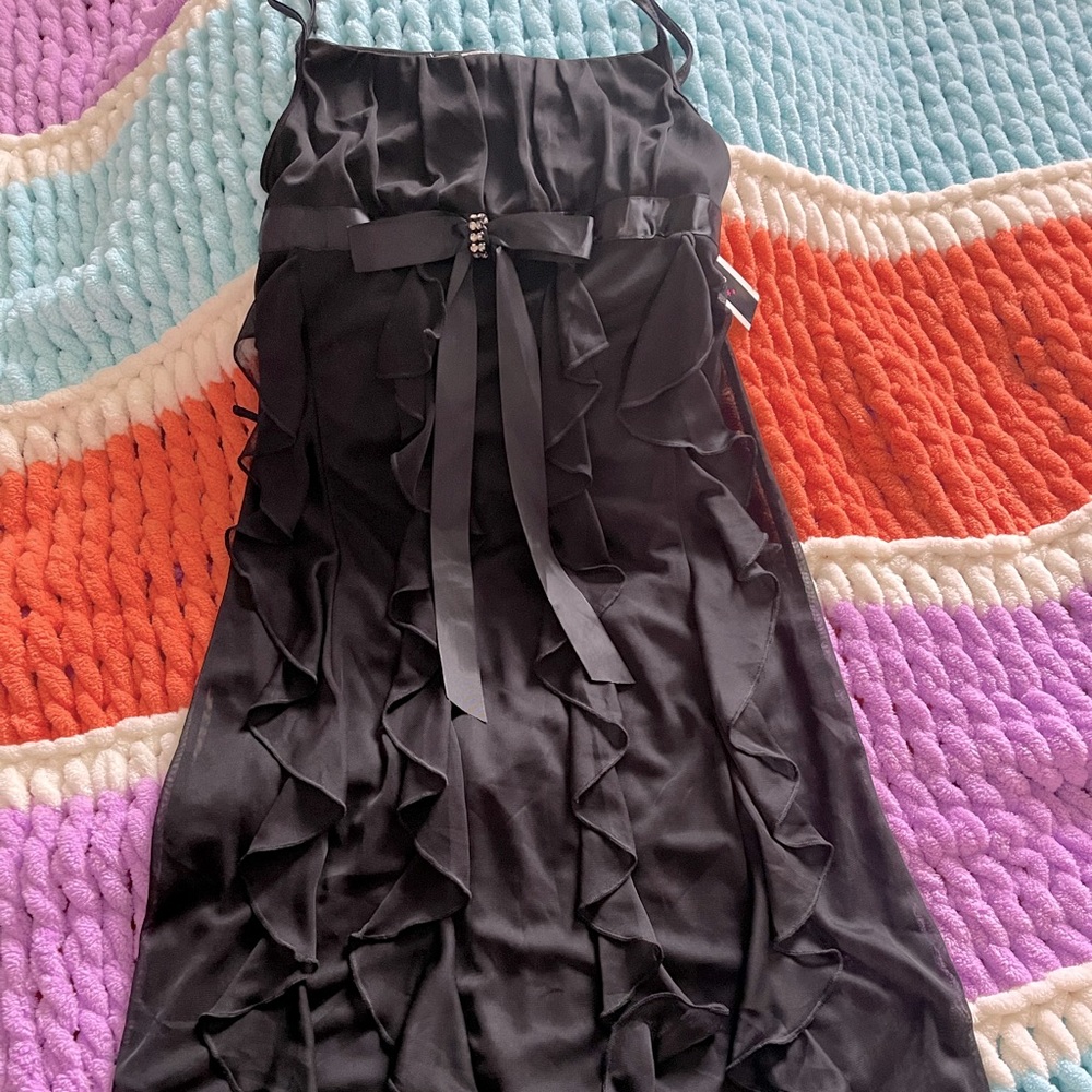 Girls size 12 Beautiful Black dress. New never worn with tags